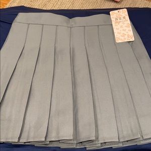 Pleated mini skirt